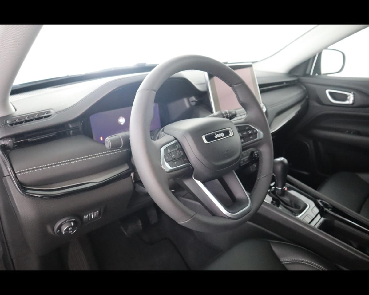 https://cdn-sp.caraffinity.it/SP/IT/JEEP-COMPASS-E-HYBRIDE-2426145_13.JPG