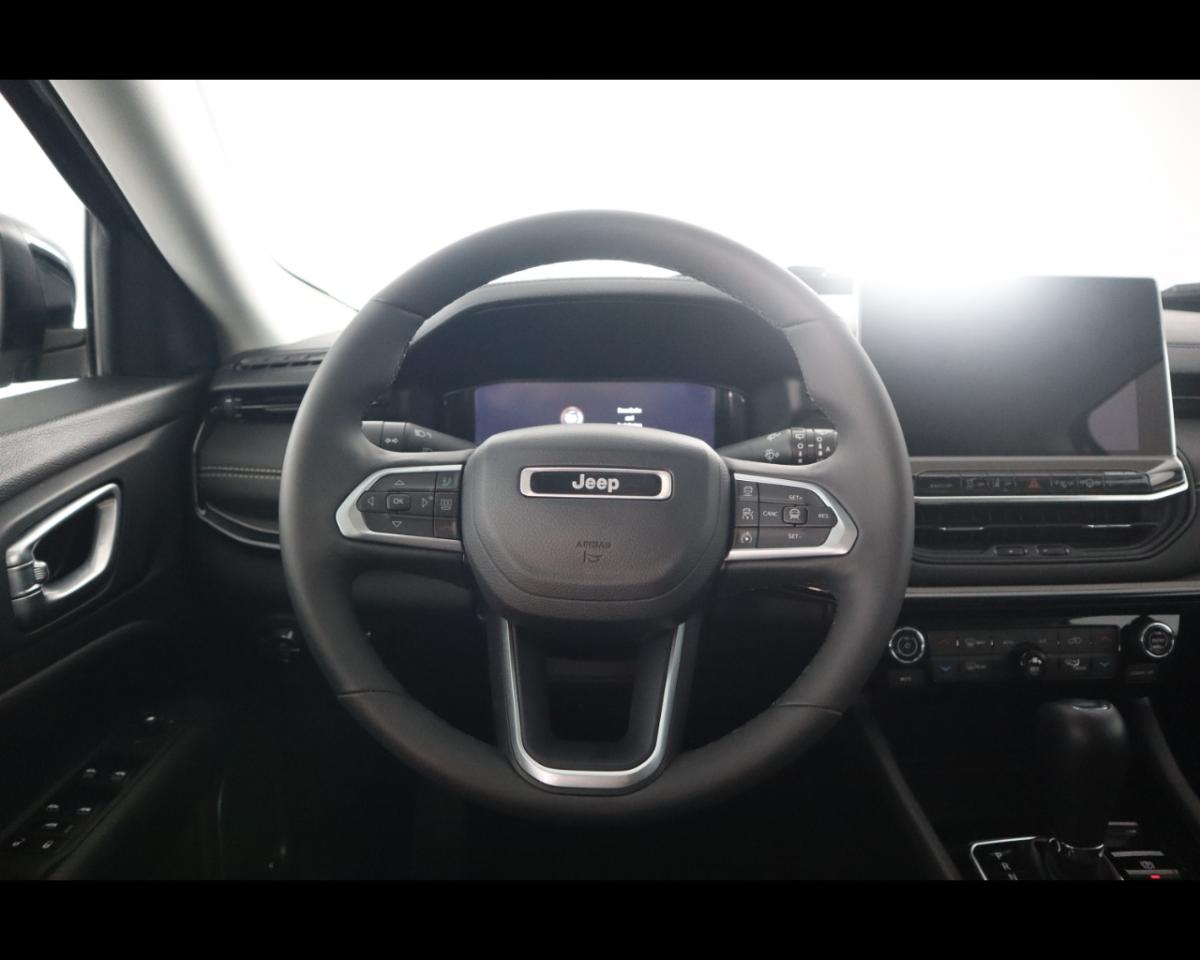 https://cdn-sp.caraffinity.it/SP/IT/JEEP-COMPASS-E-HYBRIDE-2426145_14.JPG